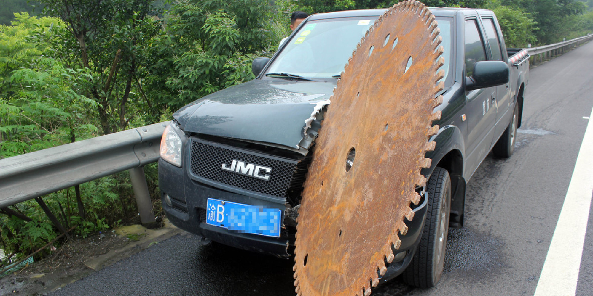Runaway Saw Blade Rolls Down Highway, Slices Truck, Narrowly Misses