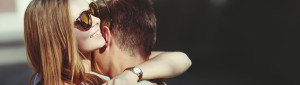 teenage couple hugging
