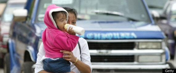 Hispanic Mother With Baby