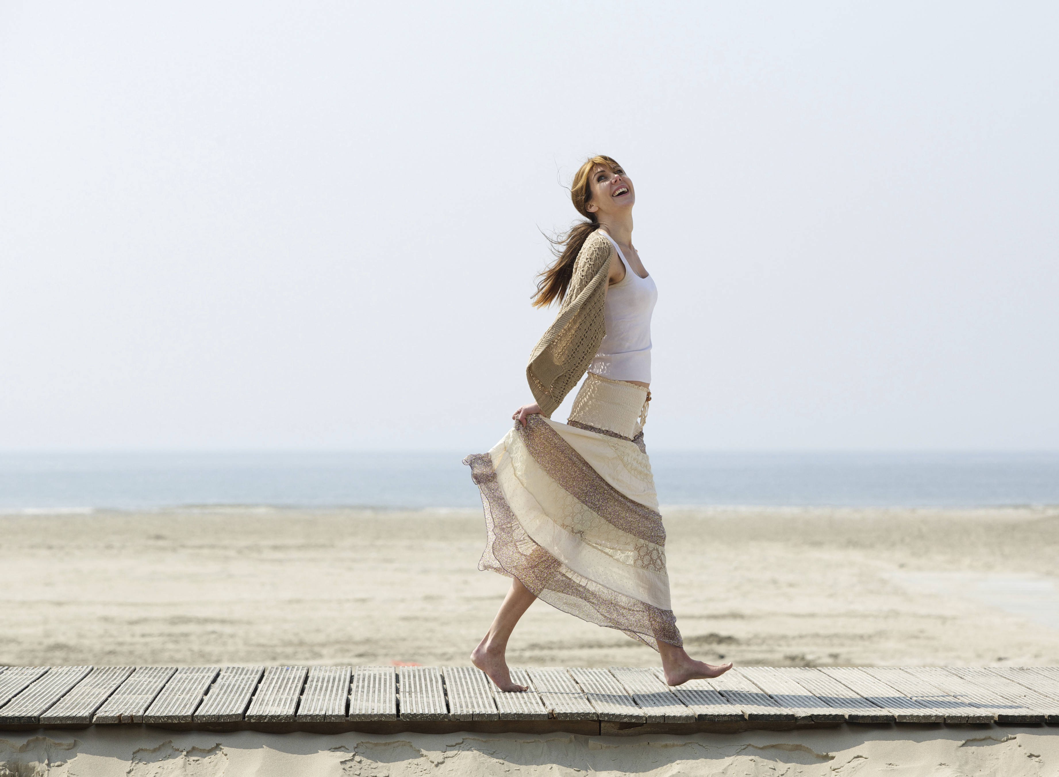 woman walking beach