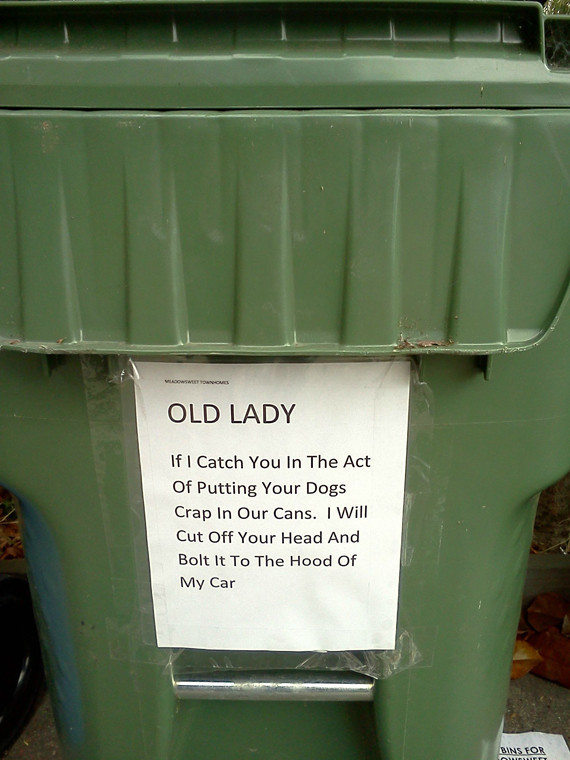 Unnecessarily Threatening Trash Can Warning Sign About Dog Poop (PHOTO