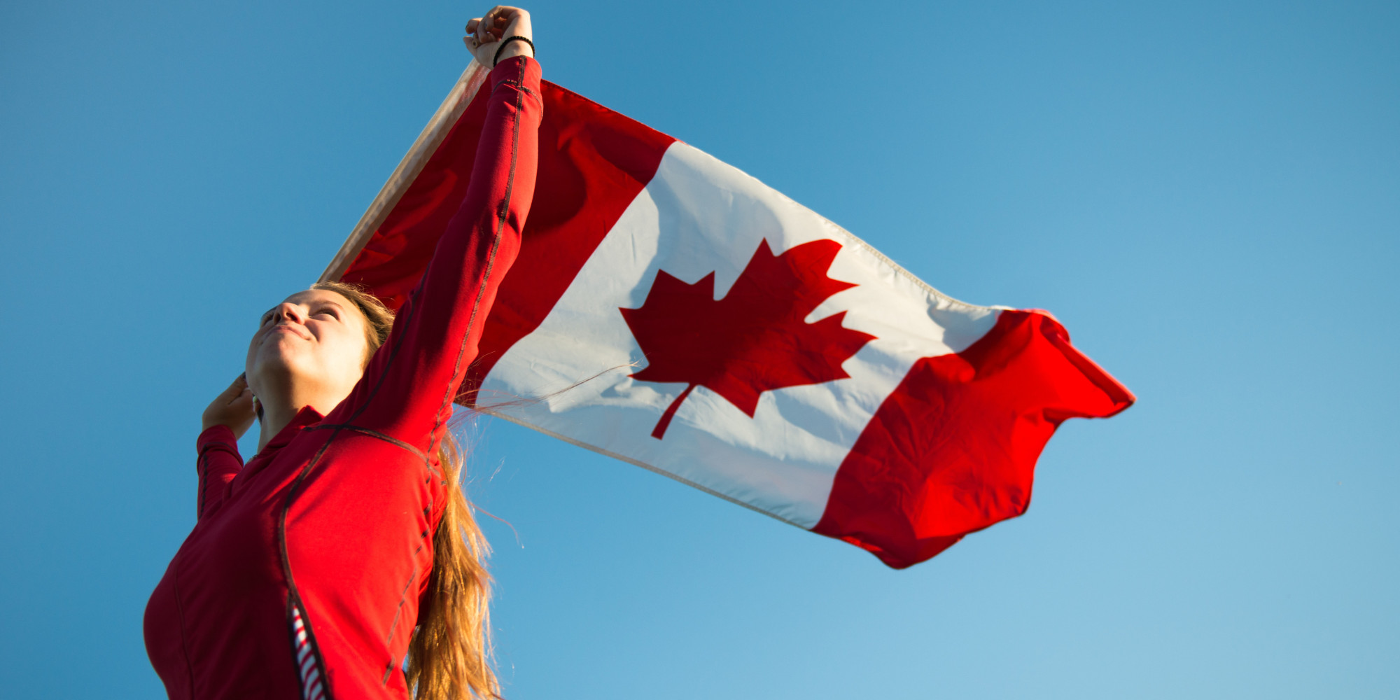 o-TEEN-HOLDING-CANADIAN-FLAG-facebook.jpg