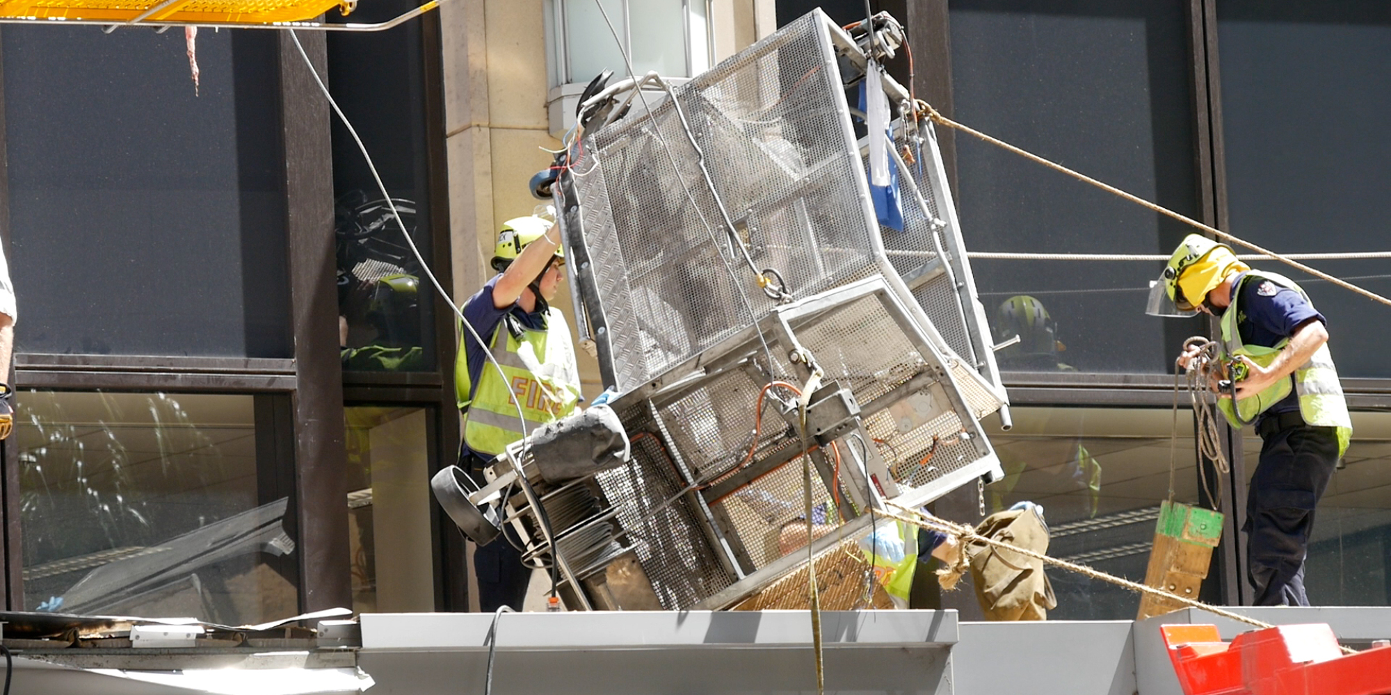 two window cleaners plunge from high rise land on awning two window cleaners plunge from high rise land on awning