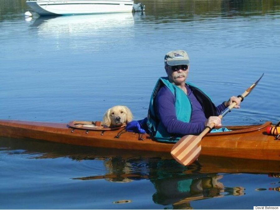 Man Builds Kayak With Two Dog Shaped Holes And The Result Is Adorable