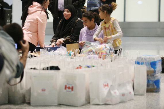 the arrival of syrian refugees to toronto airport