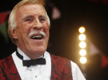 Sir Bruce 'On The Mend' Following Life-Saving Op