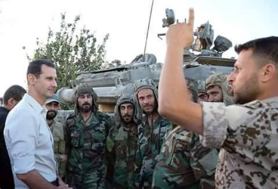 الأسد مشاركاً جنوده طعام الإفطار: هذه أطيب لقمة في حياتي O-BASHAR-570