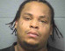 Exulam I. Holman, Joliet Man, Allegedly Gouged Out Uncle's Eyes In Argument Over Remote