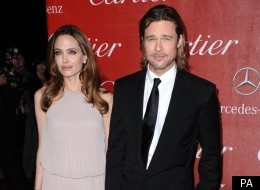 Angelina And Brad Light Up The Red Carpet (But Why's He Got A Walking Stick?)