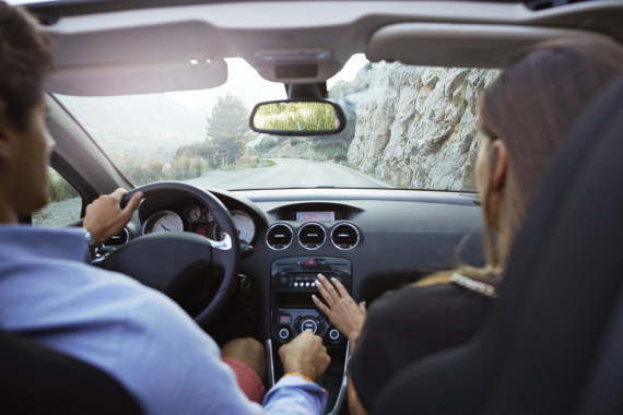 man and woman in a car