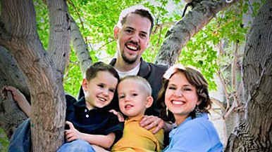 Josh and Susan Powell and their two sons in a family portrait