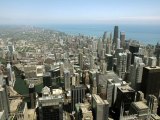 CHICAGO - JUNE 07: (FILE PHOTO) The Chicago skyline with Lake Michigan in the background are visible from atop the Sears Tower Skydeck observation deck June 7, 2006 in Chicago, Illinois. Chicago, along with Madrid, Tokyo, and Rio de Janeiro were picked by the International Olympic Committee as finalists to potentially host the 2016 Summer Olympics. (Photo by Tim Boyle/Getty Images)