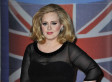 Adele Sports A Suspicious Ring