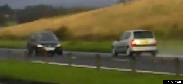 WATCH: Man Drives On Wrong Side Of Road At 70 MPH (NSFW)