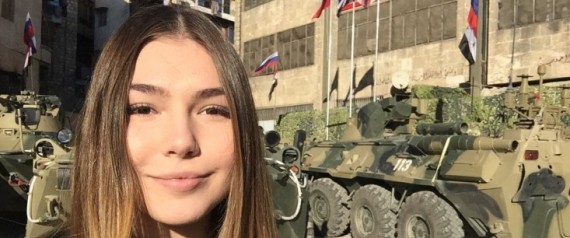 "أقوى فتاة في العالم" تتجوَّل في سوريا.. هكذا نقلت "أميرةُ الحديد" الروسية الحرب لـ85 ألفاً من متابعيها