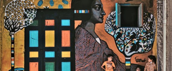 الكاميرا اكتشفتهم صدفة.. رسامون يحولون جدران قرية مصرية إلى لوحات فنية رائعة