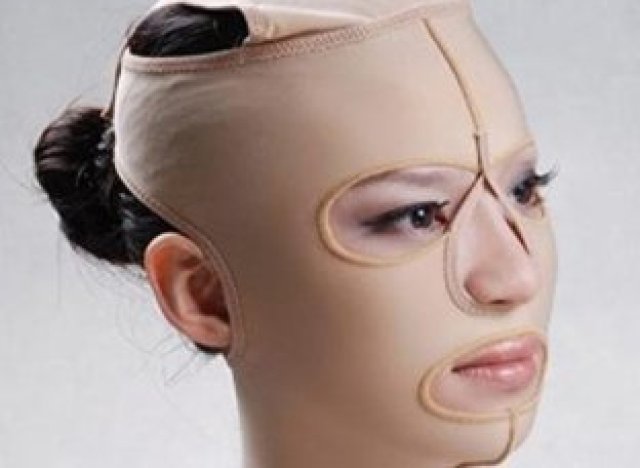 Die Maske für die Person mit dem Öl von den Falten der Apfelsine