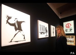 PHOTOS: Banksy's Painting Up For Auction