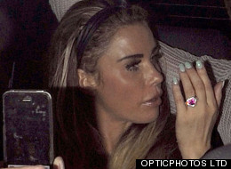 Katie Flashes Her Ring