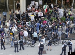  ... Summit Gives City Coveted Global Spotlight, Attracts Protests (PHOTOS