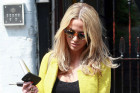 Sarah Harding Shows Off Her Toned Abs...