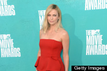 Charlize Theron Wows In Red Dress At MTV Movie Awards