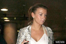 Did Coleen Out-Style Victoria At The Airport?