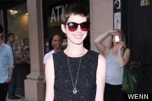 Anne Hathaway Hits New York Premiere In Textured LBD And Patterned Pumps