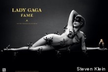 Lady Gaga Bares All, Is Attacked By Miniature Men For Fame Ad Campaign