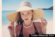 Miranda Kerr Poses In Pearls, Gets Glamorous On The Beach In Australia
