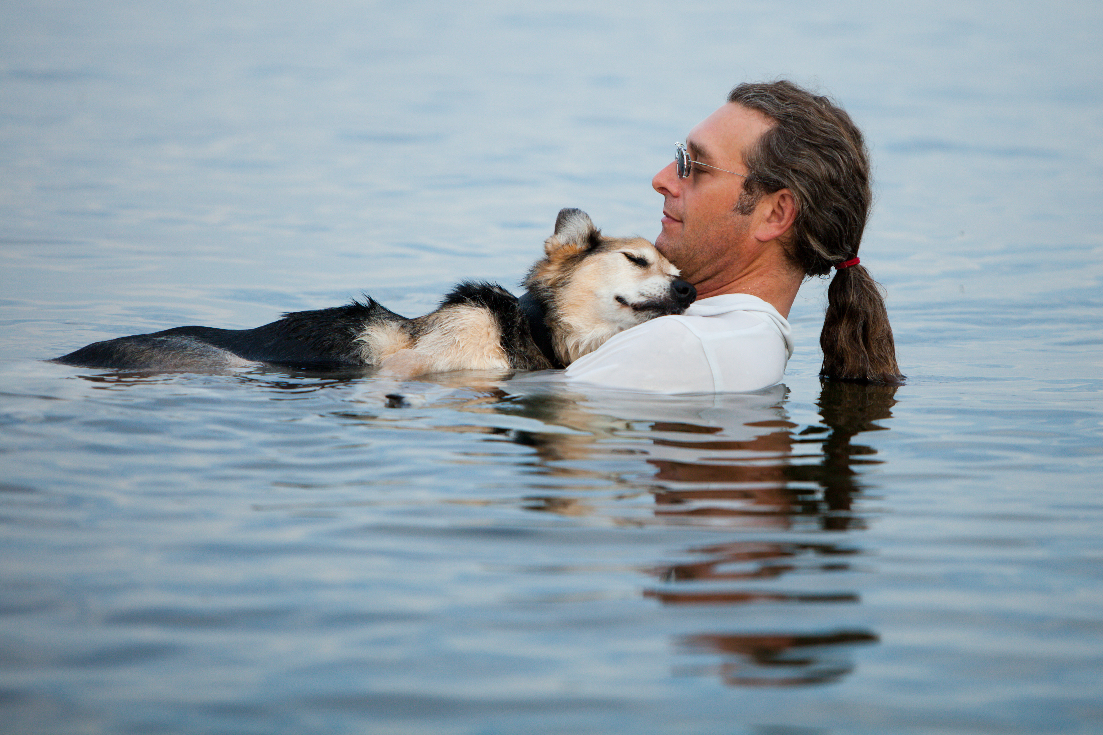 man dog lake suprerior photo