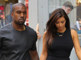 Kim Kardashian Wears Kanye West's Shoes Again...