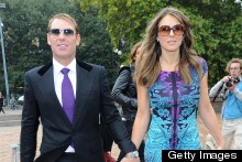 Liz Hurley And Shane Warne Colour Co-Ordinate For Roberto Cavalli F-Row