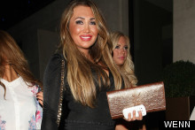 On Your Bike: Lauren Goodger Pedals Around Town In Animal Print Skirt And Stilettos
