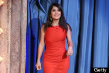 Salma Hayek Wraps Her Killer Curves In Tangerine