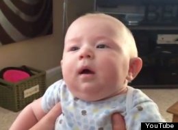 WATCH: This Baby Is Obviously More Of A Dog Person