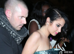 Look Who's Putting A Protective Arm Around Tulisa...