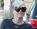 PHOTO: Miley Cyrus Steps Out In Crop Top & Thigh High Boots