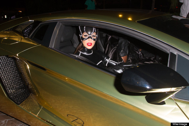 Kim Kardashian Rolls Up To Halloween Party In Gold Lamborghini