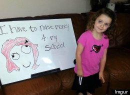 Girl's Adorable Photos Raise $1,000 For School