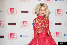 Sexy Catsuit Vs Statement Gown: Rita Ora Wows In Two Scarlet Ensembles at MTV EMAs