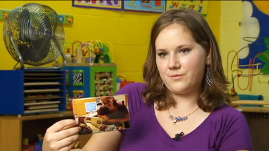 Girl holding a photo