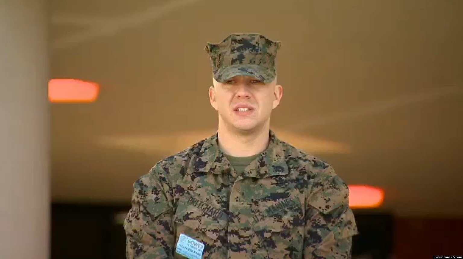 Ex-Marine dad stands guard at school after Newtown - CBS News
