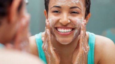 Girl washing face