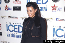 Bump Watch: Kim Kardashian Shows Off Burgeoning Belly In Black