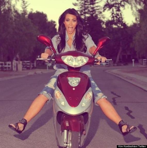 pregnant kim kardashian rides bike