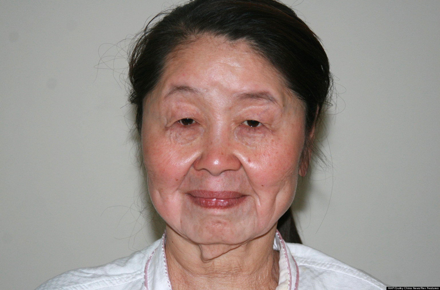 Old Asian Woman And 54