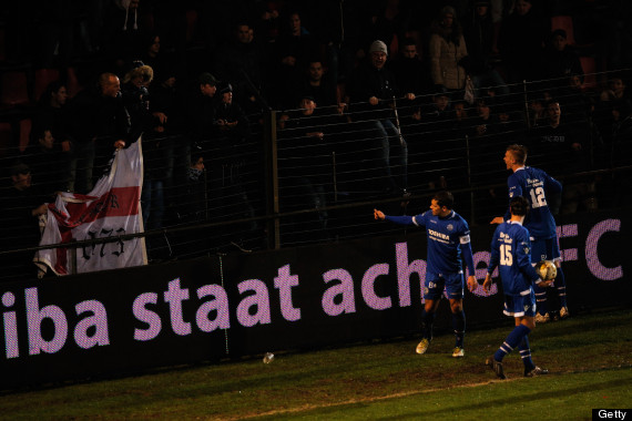 den bosch players try to calm their following