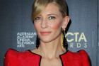 Cate Blanchett Sports Odd Red Latex-Like Gown...