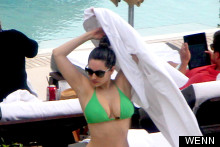 Kelly Brook Shows Thom What He's Missing In Teeny Green Bikini